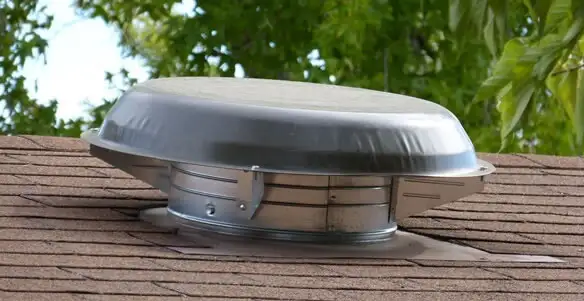 attic fan installation services with low-profile roof ventilation unit in Minneapolis, MN
