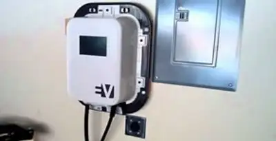 Electric car charger installation with wall-mounted EV charging station in Minneapolis, MN