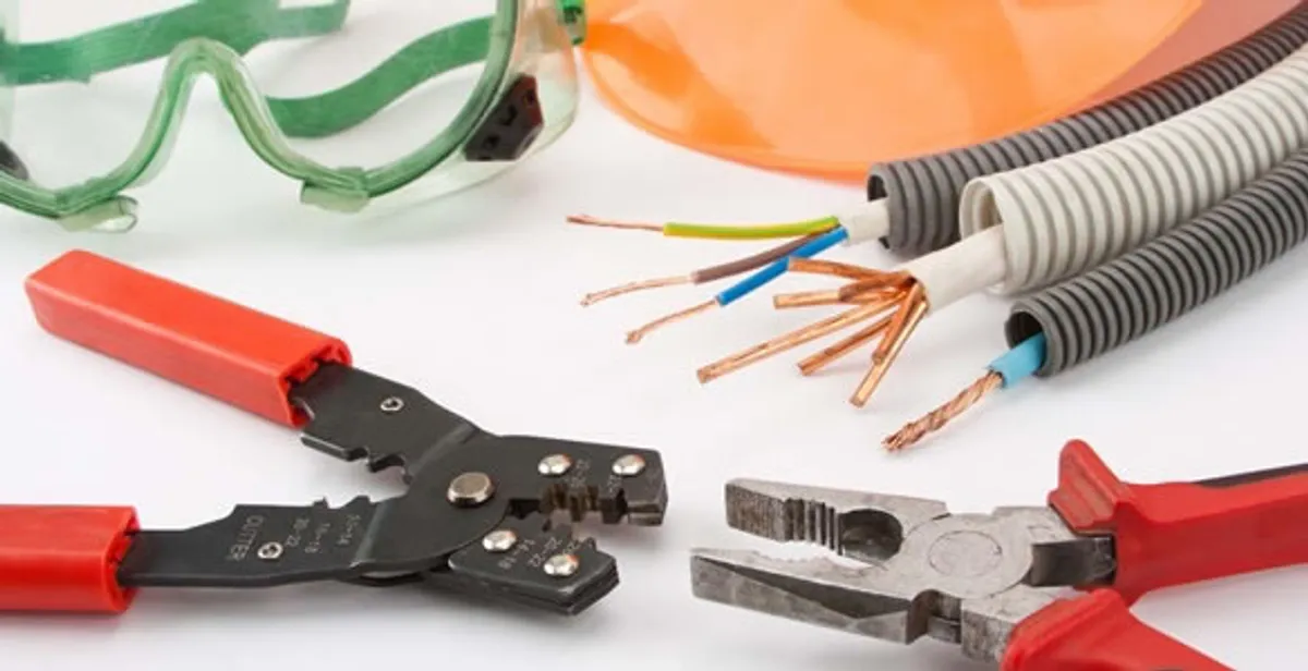 Electrical wiring repair with professional tools and safety equipment in South Saint Paul, MN