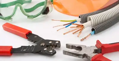 Electrical wiring repair with professional tools and safety equipment in South Saint Paul, MN