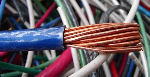 electrical wiring services showing exposed copper conductors and cable preparation in Minneapolis, MN