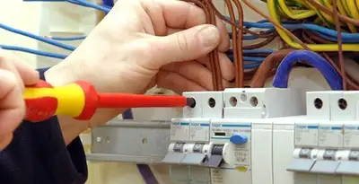 electrician services performing professional electrical panel wiring and connections in Minneapolis, MN