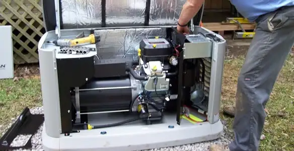 generator installation service showing technician connecting and configuring generator components in Minneapolis, MN