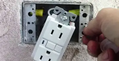 gfci circuits service showing installation of a ground fault circuit interrupter outlet by licensed electricians in Minneapolis, MN