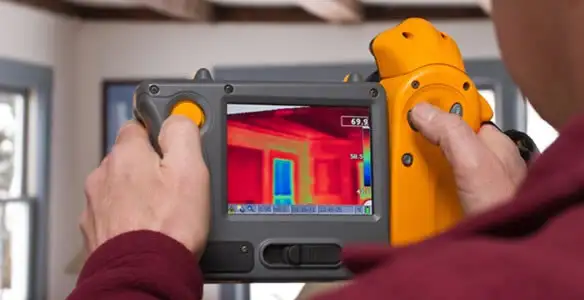 home energy audit service capturing thermal readings to analyze insulation and electrical efficiency in Minneapolis, MN