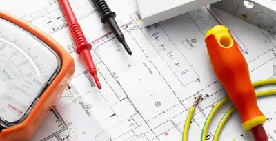 licensed electrician planning and testing electrical systems using professional tools in Minneapolis, MN
