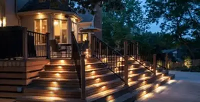 Residential electrician installing outdoor lighting for home safety in Minneapolis, MN