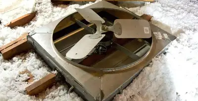 whole house fan installation services with attic-mounted ventilation unit in Minneapolis, MN