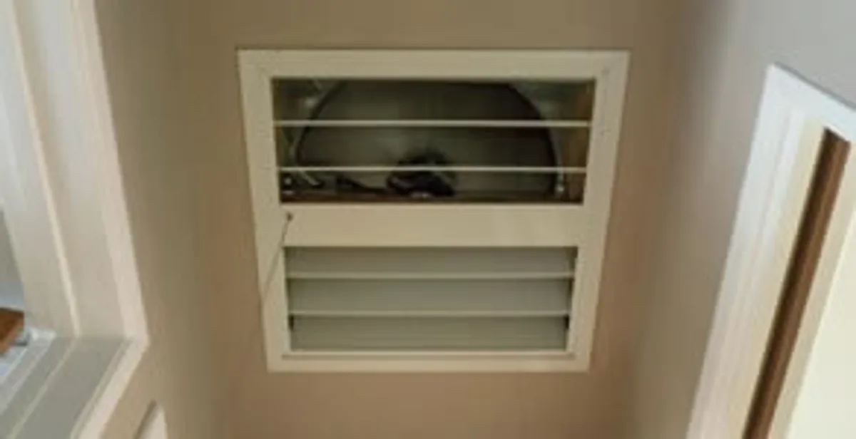 whole house fan installation services with ceiling-mounted ventilation system in Minneapolis, MN